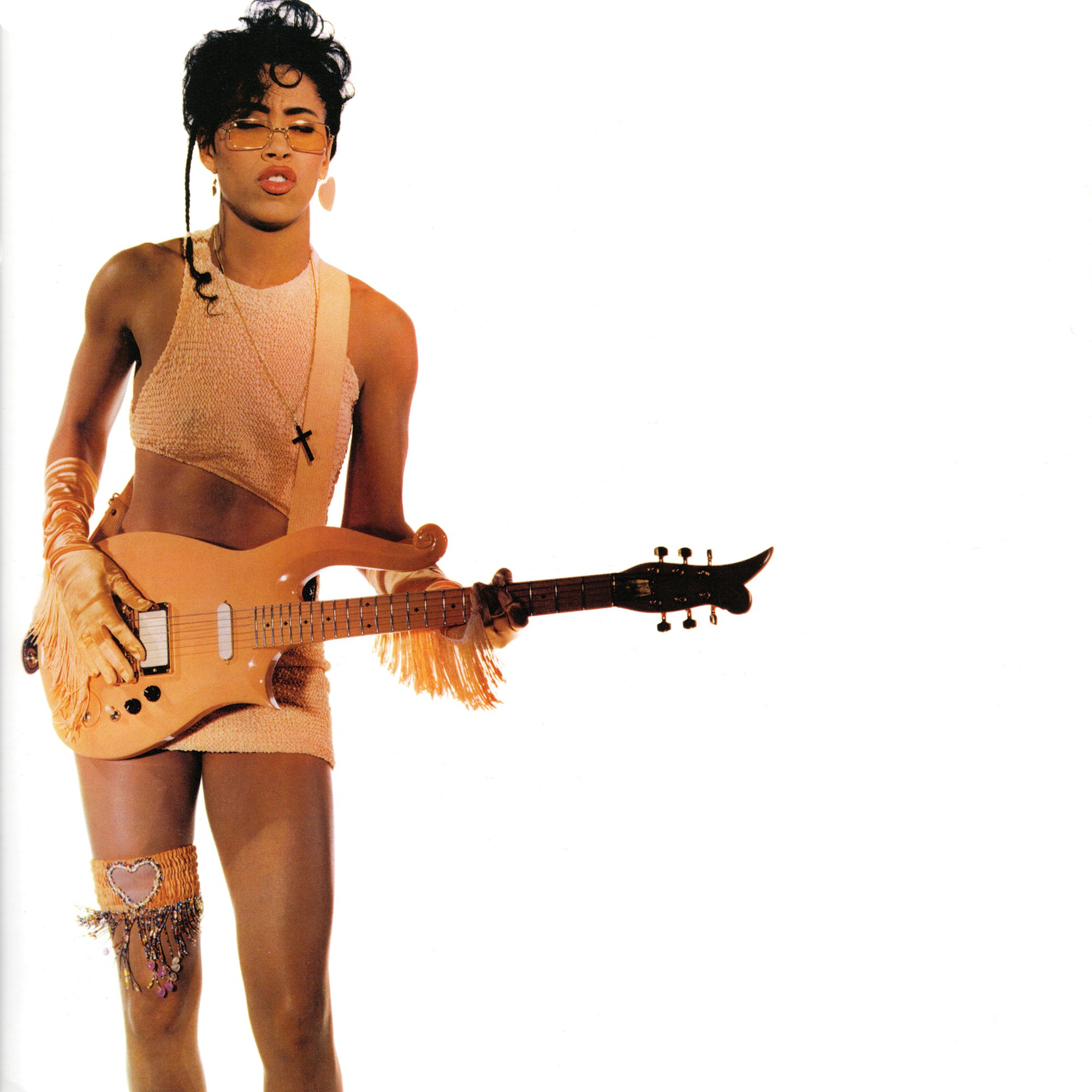 Cat on guitar from “Sign ‘O’ the Times” single.
